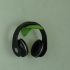Simple wall-mounted headphone holder image