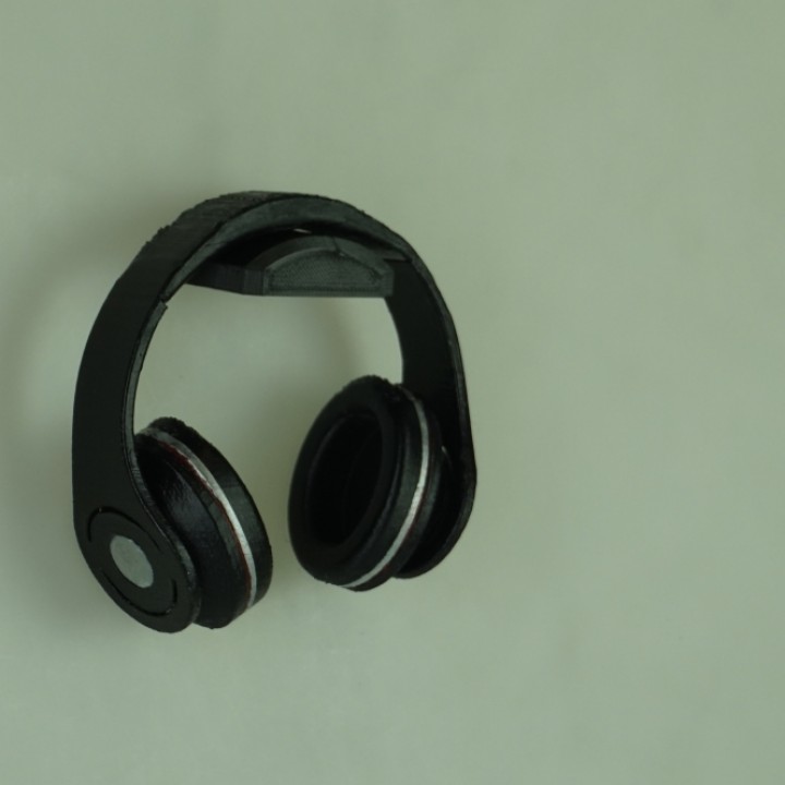 Wall-mounted headphone stand
