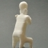Pottery figure of a woman holding a dog at The British Museum, London image