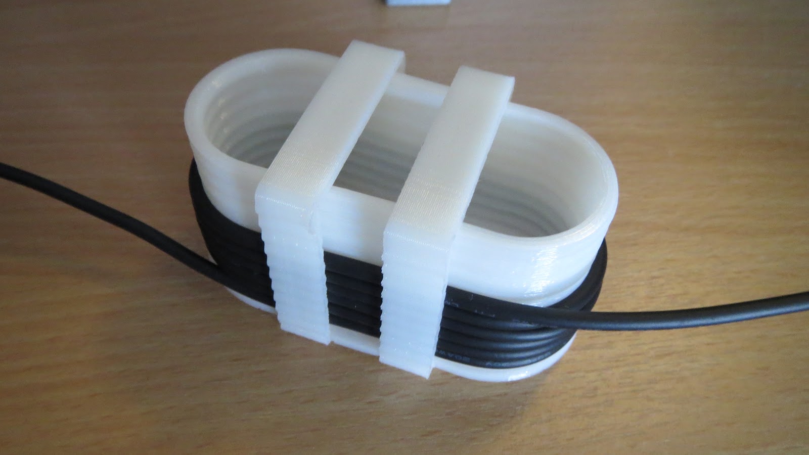 3D printed wire tidying spool