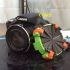 Canon SX50HS auto lens cap image