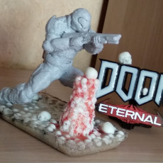 Picture of print of Doom marine (Doomguy) posed with shotgun