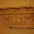 Fragment of relief with Isiac scene image