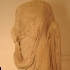 Headless statue with a toga image