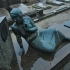 Gravestone depicting a Grieving Woman image