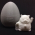 Japanese lucky cat in a surpise egg image