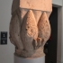 Limestone column capital in the shape of a lotus blossom image