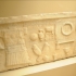 Gravestone in style of sarcophagus facade image