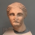 Head from colossal statue of a woman wearing a sakkos (cap) image
