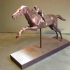 Bronze statue of a horse and young jockey print image
