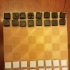 Small Chess Board and Pieces image