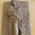 Relief of a woman holding children image