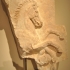 Fragment of a funerary monument with equestrian battle image