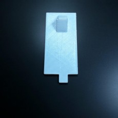 Picture of print of tv remote battery cover