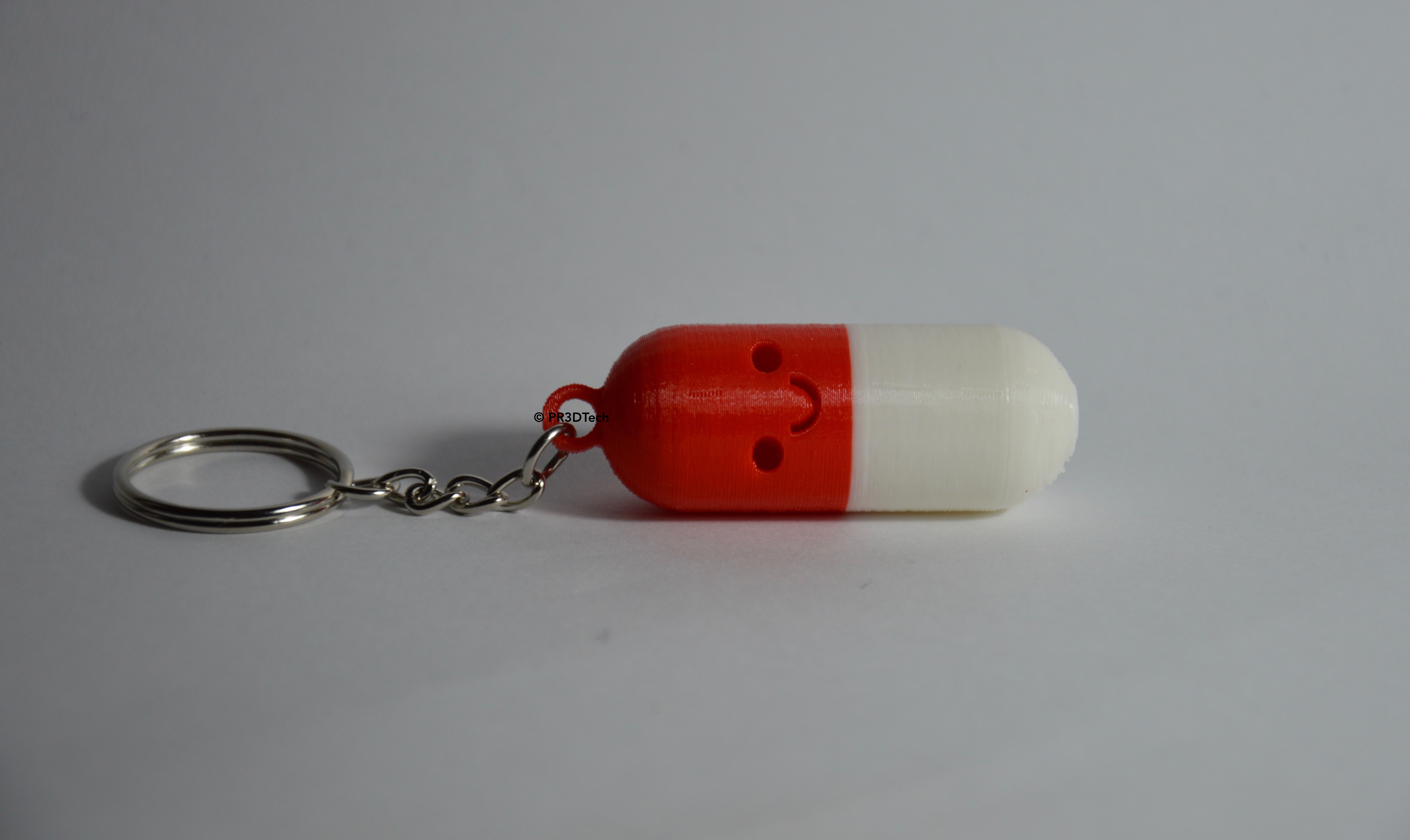 $0.99Smiling Pill Keychain/Portachiavi Pillola Sorridente