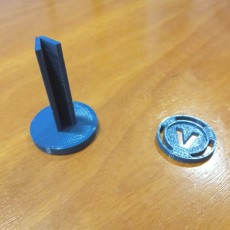 Picture of print of V-buck tokens and collection tower (reward system)