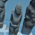 Cuman stone figures of men and women image