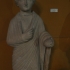 Statue of a boy with an apple image