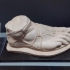 Male Right Foot Wearing a Sandal image