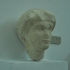 Female head (part of funerary relief) image
