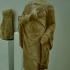 Hermaic stele with himation image