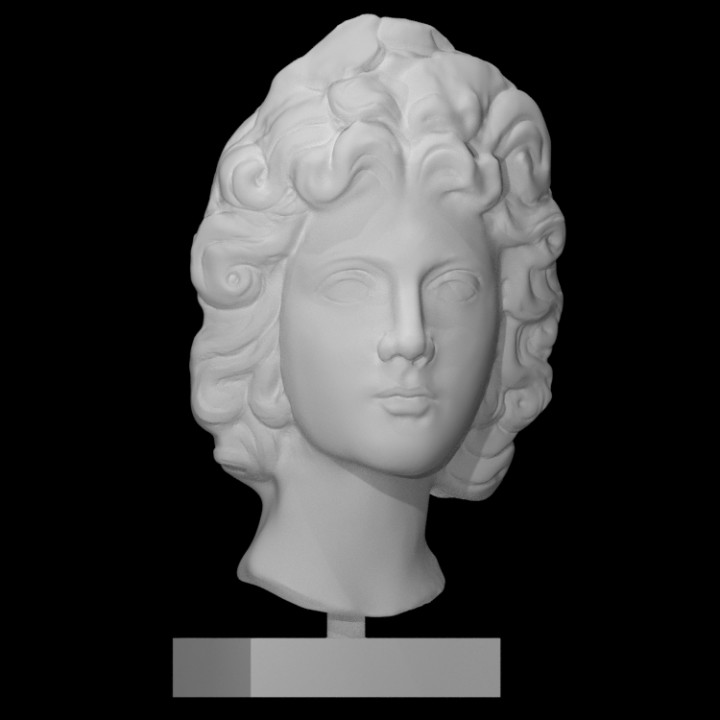 A Roman marble head of a god