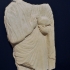 Funerary relief with a human figure and a bird image