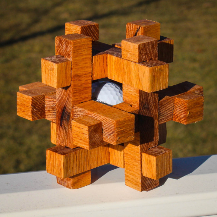 Caged Golf Ball Puzzle