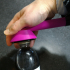 Bottle opener/assistance device image