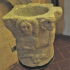 Stoup with figurative carvings image