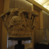 Capital with depictions of humans and angels image