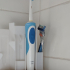 Toothbrush and razor holder image