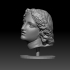 Wreathed female head from retinue of Dionysos image