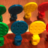 Ravensburger Labyrinth Contest consists of a Yellow, Green, Red, and Blue Players. image