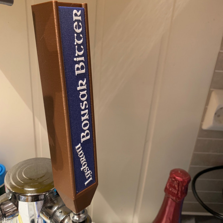 Tap handle with customizable text