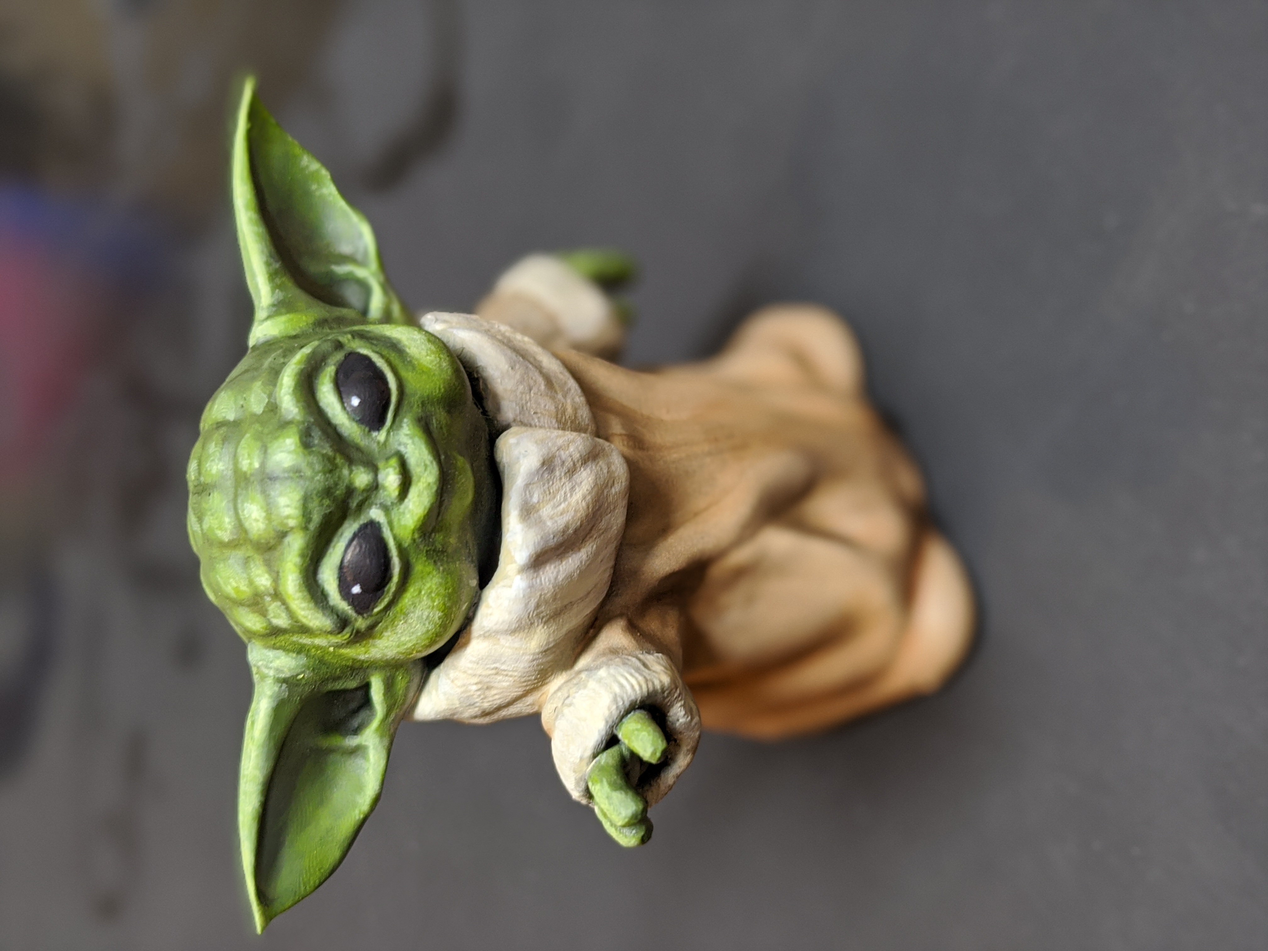 3D Printable Baby Yoda Smiling by David Magginnis