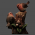 2 Robins and Pinecones image