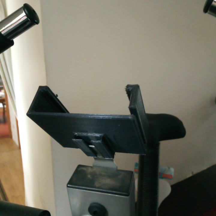 Slotted Mobile phone holder for exercise bike