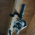 Ceiling mount for fishing poles or other items. image